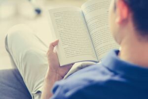 man reading a book