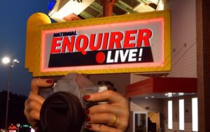 national enquirer live sign at night