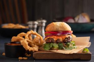 burger with a side of onion rings